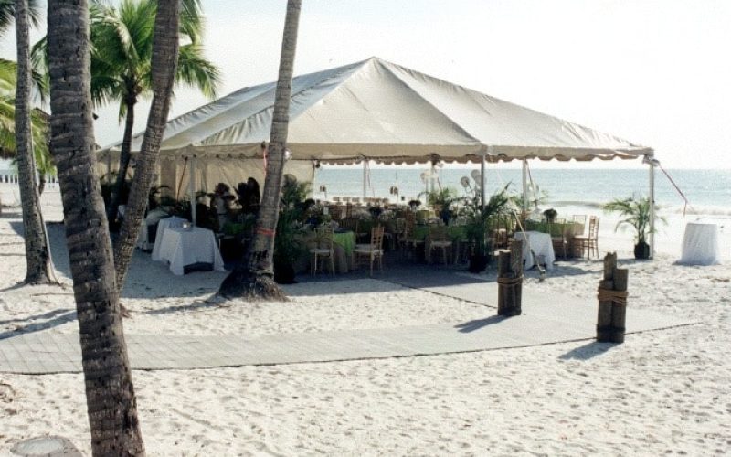 Beachside destination wedding setup by Creative Events & Rentals